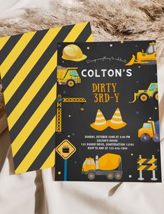 two construction themed birthday party cards on top of a white bed with yellow and black stripes