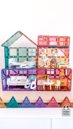 a doll house made out of plastic blocks