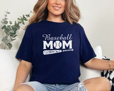 ABOUT OUR Baseball Mom T-Shirt, Baseball Shirt For Women, Sports Mom Shirt, Mothers Day Gift, Cute Baseball Tee, Baseball Mom Gift, Baseball Lover   👉 Unisex T-shirt - 100% Airlume combed and ringspun cotton  - Soft cotton and quality print make users fall in love with it over and over again.  - These t-shirts have-ribbed knit collars to bolster shaping. - Printed and shipped from the USA CARE INSTRUCTIONS - Wash inside out with like colors. - Tumble dry or hang to dry. - Try not to iron direct Sporty Crew Neck T-shirt For Mother's Day, Mother's Day Sports T-shirt With Letter Print, Sporty Letter Print Tops For Mother's Day, Sporty Short Sleeve Tops For Mother's Day, Baseball Mom Gifts, Baseball Mom Shirt, Sports Mom Shirts, Baseball Mom Shirts, Women Sports