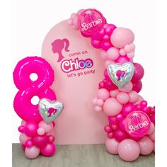 balloons are arranged in the shape of numbers and heart shapes for a balloon party at a children's birthday