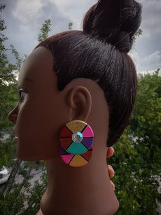 "Beautifully unique, hand crafted from start to finish.The block colour patterns are hand painted and transformed into a vision of BEAUTY. The rich colourful patterns & iridescent non-toxic glitter harmonizes beautifully together. This gorgeous pair sits prettily on the ear. They're very attractive and lightweight. The posts are HYPOALLERGENIC.  Customers may experience each pair may be made slightly different for originality for each customer. To provide a \"One of a Kind\" experience. No two earrings may be exactly the same for the purpose of originality.  *Disclaimer: PRODUCT COLOR MAY SLIGHTLY VARY DUE TO PHOTOGRAPHIC LIGHTING SOURCES OR YOUR MONITOR SETTINGS. *ACTUAL COLOR MAY VARY SLIGHTLY DUE TO CAMERA LIGHTING & VARIOUS COMPUTERS AND/OR PHONES" Multicolor Hand Painted Earrings, Hand Painted Multicolor Modern Earrings, Modern Multicolor Jewelry With Bold Design, Hand Painted Multicolor Earrings For Party, Modern Multicolor Geometric Jewelry, Hand Painted Multicolor Party Earrings, Unique Hand Painted Party Earrings, Modern Multicolor Earrings With Bold Design, Multicolor Geometric Earrings For Gift