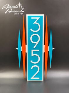 a blue and orange sign with the number 2050 on it's side in front of a gray background