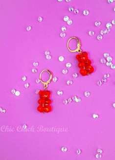 New Minimalist 14k Gold Plated Cute "Yummy Gummy" Bear Huggie Hoop Earrings in Red Handmade Jewellery Introducing the Yummy Gummy Bear Collection! These playful and vibrant earrings feature 14k gold-plated huggie hoops paired with adorable acrylic bear charms, perfectly mimicking the look of your favourite gummy bears. Handmade with care, each pair in this collection comes in a variety of fun and colourful options, making them the perfect accessory to add a touch of whimsy to any outfit. The sma Trendy Red Earrings For Birthday, Playful Red Dangle Jewelry, Playful Hypoallergenic Hoop Earrings As Gift, Playful Hypoallergenic Hoop Earrings For Gift, Playful Red Hypoallergenic Jewelry, Playful Small Hoop Jewelry For Gifts, Playful Small Hoop Jewelry Gift, Playful Red Nickel-free Jewelry, Playful Red Jewelry For Birthday