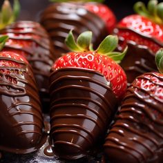 chocolate covered strawberries sit on top of each other