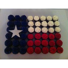 an american flag made out of red, white and blue cupcakes