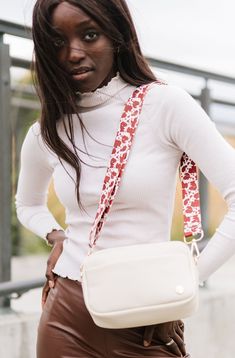 On-trend cow print in contrasting burnt umber and white hues, plus gold hardware and an adjustable length. Your inner cowgirl needs the Montana Cow Print Bag Strap! Details: Adjusts from 28" - 49" long; 1.5" wide Paired with the Willow Convertible Crossbody in cream (sold separately) White Shoulder Bag With Detachable Strap For Fall, White Shoulder Bag With Adjustable Strap For Fall, Cow Print Bag, Adjustable Bag Strap, Burnt Umber, Adjustable Bag, Timeless Accessories, Boutique Brands, Modern Chic