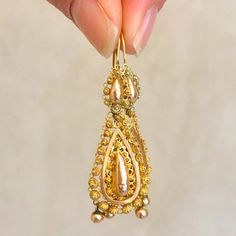 For Sale on 1stDibs - Pair of 14 karat gold dangle earrings crafted with a rich design of fine filigree and cannetille work. The earrings are very skillfully handcrafted. Each Antique Yellow Gold Drop Earrings, Formal Yellow Gold Chandelier Earrings With Intricate Design, Ornate Yellow Gold Dangle Chandelier Earrings, Ornate Yellow Gold Chandelier Dangle Earrings, Victorian Yellow Gold Drop Earrings, Antique Filigree Chandelier Earrings For Formal Occasions, Yellow Gold Engraved Drop Earrings, Victorian Engraved Yellow Gold Earrings, Victorian Style Engraved Yellow Gold Earrings