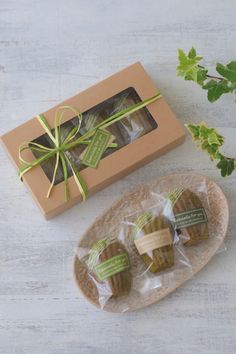 three packaged cookies sitting on top of a plate