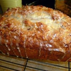 a loaf of bread sitting on top of a cooling rack