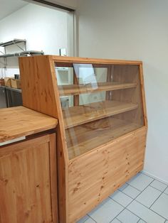 a wooden counter top sitting inside of a kitchen