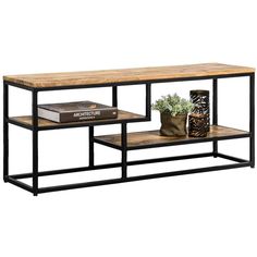 an industrial style coffee table with two shelves on one side and a planter on the other