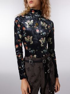 a woman wearing a black shirt with a floral print Fitted Long Sleeve Bodysuit With Floral Print, Fitted Long Sleeve Bodysuit With Button Closure, Fitted Long Sleeve Bodysuit With Buttons, Fitted Bodysuit With Button Closure For Fall, Closet Refresh, Floral Clothing, Clothing Details, Floral Outfit, Velvet Fashion