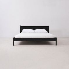 Plume Bed Beds in Black Black Low Bed Frame, Black Wooden Bed, Black Beds, Low Bed Frame, Black Bed, Watching A Movie, Ceramic Furniture, Bed Black, Steel Bed