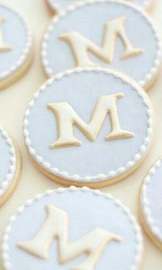 decorated cookies with the letter m on them