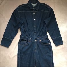 Nwot Partial Tag Zara Jean Denim Jumpsuit Dark Wash Long Sleeve 100% Cotton Button Up Excellent Beautiful Unique Piece Americana Western Rodeo Urban Classic Size Medium Approx 21” Across Armpits 20” Shoulder To Top Of Waist And 33” Inseam, 44” Outer Seam From Waist To Leg Opening Best Offers Welcome. Dark Wash Long Sleeve Denim Jumpsuit With Button Closure, Dark Wash Buttoned Cotton Denim Jumpsuit, Fitted Denim Jumpsuit With Buttons For Work, Fall Denim Jumpsuit With Long Sleeves And Buttons, Fall Long Sleeve Denim Jumpsuit With Buttons, Denim Button-up Overalls With Buttons, Button-up Denim Overalls With Buttons, Button-up Denim Overalls, Buttoned Denim Overalls