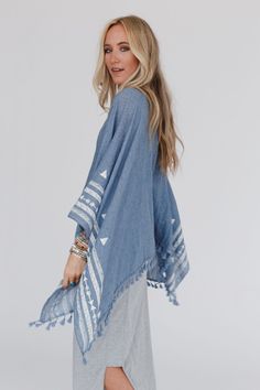 The Fallon Embroidered Sleeve Poncho you know and love, but NOW offered as the Fallon Embroidered Sleeve Tassel Poncho! We know you'll love wearing this poncho because it features: Lightweight flowy woven fabric Flowy poncho silhouette (no sleeves, edges tacked with a small seam) So cute embroidered geometric shapes along bottom edge Finished with a cute tassel bottom edge Comfortable boho outfit you'll love pair with: Floral Cut Out High Neck Bralette, Delaney Distressed Wide Leg Pants, Sunburs Womens Boho Tops, Boho Essentials, Boho Outfit, Bohemian Women, Bohemian Tops, Sweater Sale, Boho Blouses, Vintage Style Outfits, Boho Tops