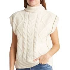 Layer On This Mock-Neck Sweater Vest Featuring A Cable-Knit Design With Ribbed Trim And Contrast Piping For Cozy Style. Mock Neck Sleeveless Cable Knit Construction Ribbed Trim 70% Acrylic, 30% Cotton Dry Clean Or Machine Wash, Dry Flat Imported Model Stats: 5'10" Height, 32" Bust, 25" Waist, 36" Hip. Model Is Wearing Size S. Chunky Knit Sweater Vest For Fall, Cable Knit Turtleneck Top For Cold Weather, Crew Neck Knit Sweater Vest For Fall, Fall Crew Neck Knit Sweater Vest, Knit Sweater Vest With Crew Neck For Fall, Knit Turtleneck Sweater Vest For Layering, Trendy Turtleneck Knit Sweater Vest, White Chunky Knit Sweater Vest For Fall, Boho Fringe Sweater