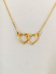 "Beautiful vintage double heart gold plated pendant necklace from our own 1980's collection. Heart pendant measures 1\" across x 1/2\" long x 2mm thick and comes with an 18\" long gold overlay link chain." Gold Double Heart Charm Necklace, Gold Double Heart Necklace For Anniversary, Double Heart Gold Necklace For Anniversary, Double Heart Necklace, Gold Link Chain, Gold Overlay, Gold Heart Necklace, Double Heart, One Inch