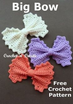 three crocheted bows with the words crochet n'create on them