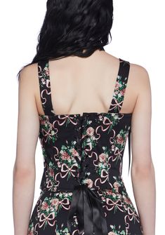 cuz you exude a dark enchantment. This top has a taffeta construction, an all over floral bow print, structured boning, satin ribbon ties, a back lace-up design, and a side zipper closure. Spring Satin Corset With Corset Back, Sleeveless Floral Print Corset For Party, Party Floral Print Sleeveless Corset, Spring Satin Overbust Corset, Floral Print Fitted Corset For Party, Fitted Floral Print Corset For Party, Fitted Floral Print Party Corset, Spring Party Corset With Tie Back, Black Boned Bodice Corset For Spring