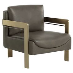 a gray leather chair with gold frame