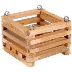 three wooden crates stacked on top of each other with metal studs in the middle