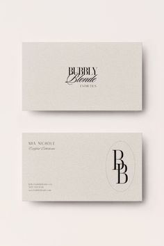 two white business cards with black lettering on the front and back, one is for bubbly