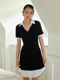 This is a trendy and feminine dress by SALON DE YOHN that is made out of high quality and sturdy material. With distinctive mood of the design and modern feminine look, you can style it for your comfortable daily outfit.- Shirt collar and cuffs detail- Slim silhouette and elastic fabric- Feminine and modern mood Modern Short Sleeve Mini Dress For Work, Modern Fitted Mini Dress With Short Sleeves, Black Short Sleeve Office Lady Dress, Black Summer Dress With Collared Neckline, Black Mini Dress For Office In Summer, Modern Black Fitted Mini Dress, Modern Black Short Sleeve Dress, Trendy Short Sleeve Midi Dress For Work, Modern Black Mini Dress For Workwear