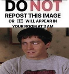 a man is sitting in front of a sign that says do not repost this image or he will appear in your room at 3 am