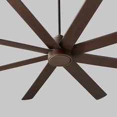 a brown ceiling fan with four blades