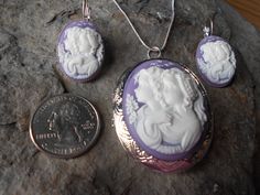 "For sale are perfectly detailed, flawless sisters, mother/daughter, generations, friends cameo pendant silver plated locket and earrings Gorgeous The locket is 2\" long and the earrings 1\" long The silver plated locket has victorian etching and holds two photos inside (or treasured keepsakes). The French earrings are also silver plated, about 1\" long and very nice quality!! Heirloom quality, to pass down from generation to generation I make this style, in several colors and even hand painted Sterling Silver Cameo Jewelry For Anniversary, Silver Cameo Earrings As A Gift, Sterling Silver Cameo Jewelry For Gift, Wedding Sterling Silver Cameo Jewelry, Silver Cameo Jewelry For Anniversary, Personalized Jewelry For Mother's Day Collectible, Collectible White Cameo Jewelry, White Hallmark Jewelry For Wedding, White Gold Cameo Jewelry Gift