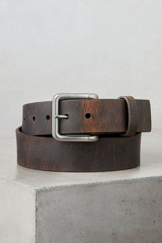 Distressed and oil-tanned harness buffalo leather gives the Pointer its rustic good looks. And its understated clean lines add depth without distraction. It's finished with a simple antiqued matte nickel buckle that's removable, and a single leather keeper. Classic Leather Belt Buckles For Everyday Use, Casual Leather Belt Buckles For Everyday, Rugged Brown Belt Buckles With Leather Strap, Rugged Belt Buckles With Leather Strap For Everyday Use, Rugged Leather Belt Buckles For Everyday Use, Rugged Brown Leather Strap Belt, Leather Belt Buckles With Brass Buckle, Leather Belt Buckles With Brass Buckle For Everyday, Bridle Leather Belt With Brass Buckle For Everyday Use