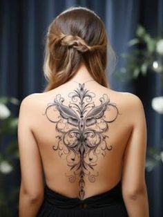 a woman with a tattoo on her back