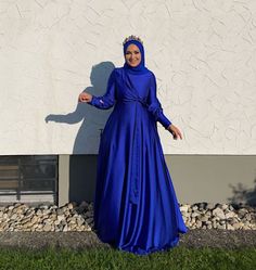 Product Details & Cares: Dress Design by HIJAB THRONE Fabric: Made of 100% Satin Round Neck Self Tie wrap front belt Not See Through Back Zip Closure Regular fit True Size TAKE CARE OF ME; Cool gentle machine wash/ do not tumble dry, soak or rub. Also, cool iron recommended to avoid damaging the fabric Please note that the color displayed in the picture might be slightly different due to color resolution and lighting. SIZE & FIT; Model wear : Size Medium SIZE CHART SIZE Bust WAIST LENGTH S 33.8 Royal Blue Dress Hijab, Blue Hijab Dress, Royal Blue Satin Dress, Satin Dress Outfit, Blue Abaya, White Hijab, Blue Hijab, Royal Blue Gown, Hijab Colors