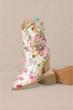 Step out in style with these Florence Floral Rhinestone Embellished Cowgirl Boots! The beautiful floral design and sparkly rhinestone embellishments add a touch of whimsy to any outfit. These boots are sure to make a statement and turn heads wherever you go. Perfect for the fashion-forward cowgirl. Yee-haw! Floral Brocade Rhinestone Embellishments Side Zipper Block Heel Brocade Designs, Mid Boots, Rhinestone Embellishments, New Arrival Dress, Cowgirl Boots, Shoes Heels Boots, Shoe Brands, Shoes Women Heels, Heeled Boots