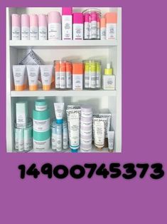 a shelf filled with lots of different types of skin care products in front of a purple background