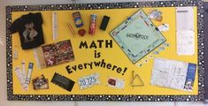 a bulletin board that says math is everywhere with pictures and magnets on it, along with other school related items