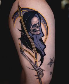 a skeleton with a bow and arrow tattoo on the thigh is shown in this image