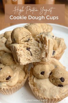 some cookies are stacked on top of each other with the words, high protein yogurt cookie dough cups