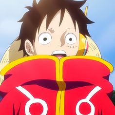 an anime character wearing a red jacket with white letters on it's chest and eyes