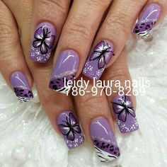 16 The Hottest Nail Designs For This Summer 2024 Purple And Silver Nails Ideas, Lavender Nails With Butterflies, Purple Butterfly Nail Designs, Nails Butterfly Design, Hottest Nail Designs, Rockabilly Nails, Spring Nail Art Ideas, Purple Nail Art Designs, Butterfly Magic