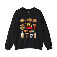 Attention all McDonald's enthusiasts who savor the flavor of the miccy d! 🍔  This witty and retro-inspired sweatshirt blends the bold flavor of your beloved McDonalds favorites with festive vibes, making it the ultimate attire for every season. Whether you're a burger connoisseur or a fan of the iconic golden arches, this cozy and playful sweatshirt is the perfect gift. Secure your limited edition piece today and spread the joy of McDonalds this  season! .: Made from a medium-heavy fabric blend Winter Pop Culture Crew Neck Tops, Retro Black Fan Merchandise Sweatshirt, Retro Winter Fan Merchandise T-shirt, Retro Black Sweatshirt For Fan Merchandise, Retro Crew Top For Streetwear, Retro Crew Neck Tops For Streetwear, Winter Pop Culture Long Sleeve Tops, Winter Long Sleeve Pop Culture Tops, Pop Culture Crew Neck Sweatshirt For Winter