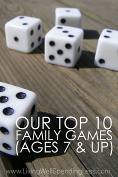 four white dices sitting on top of a wooden table with the words our top 10 family games ages 7 and up