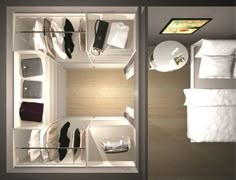 an overhead view of a bedroom with shoes on the shelves and bed in the background