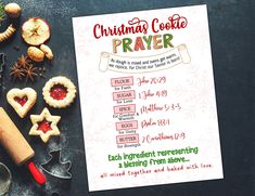 a christmas cookie prayer is shown with cookies and other holiday treats on the table next to it