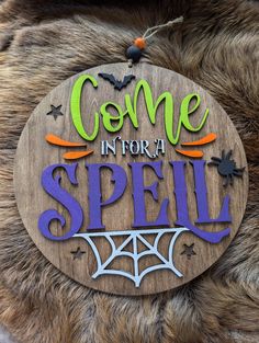 a wooden sign that says come in for a spell