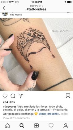 a woman's arm with a tattoo on it and the words tattooed in spanish