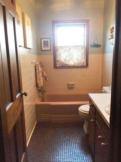 a bathroom with a sink, toilet and bathtub