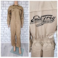 One Piece beige Coveralls vintage beige Jumpsuit mens Overalls zip up mens Coveralls utility workwear mechanic uniform M 100% cotton height of the men in the photo - 180 cm Please refer to photos for details of condition.  Condition: very good vintage Measurements : Length: 138 cm/ 54.3" Shoulder to shoulder: 47 cm/18.5" Sleeve : 55 cm/ 21.7" Bust: 107 cm/42.2" Waist 82 cm/32.3" Hips: 107 cm/42.2" Rise: 68 cm/26.8" Inseam 60 cm/23.6"  Tag Size -  46 M    note The color on the pictures may vary d Khaki Cotton Utility Overalls, Khaki Utility Jumpsuits And Rompers, Utility Cotton Khaki Jumpsuits And Rompers, Khaki Long Sleeve Utility Overalls, Mechanic Uniform, Mechanics Uniform, Mens Coveralls, Beige Jumpsuit, Mens Overalls