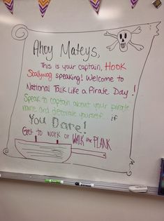 a white board with writing on it in front of a bulletin board that says they mays, this is your captain hook